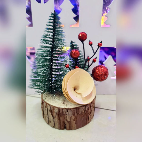 Picture of Xmas Tree on Wood Log