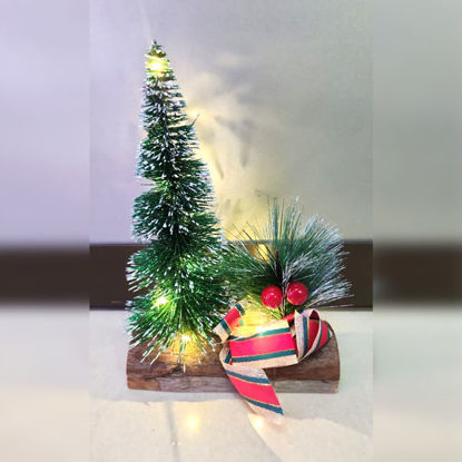 Picture of Xmas Tree On Wood Log With Light