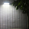 Picture of Solar Triangle Style Aluminium Wall Light 4 modes (White)